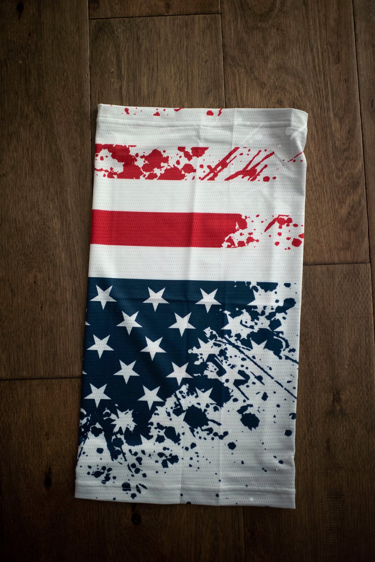 Corbah American flag neck gaiter with a distressed stars and stripes print