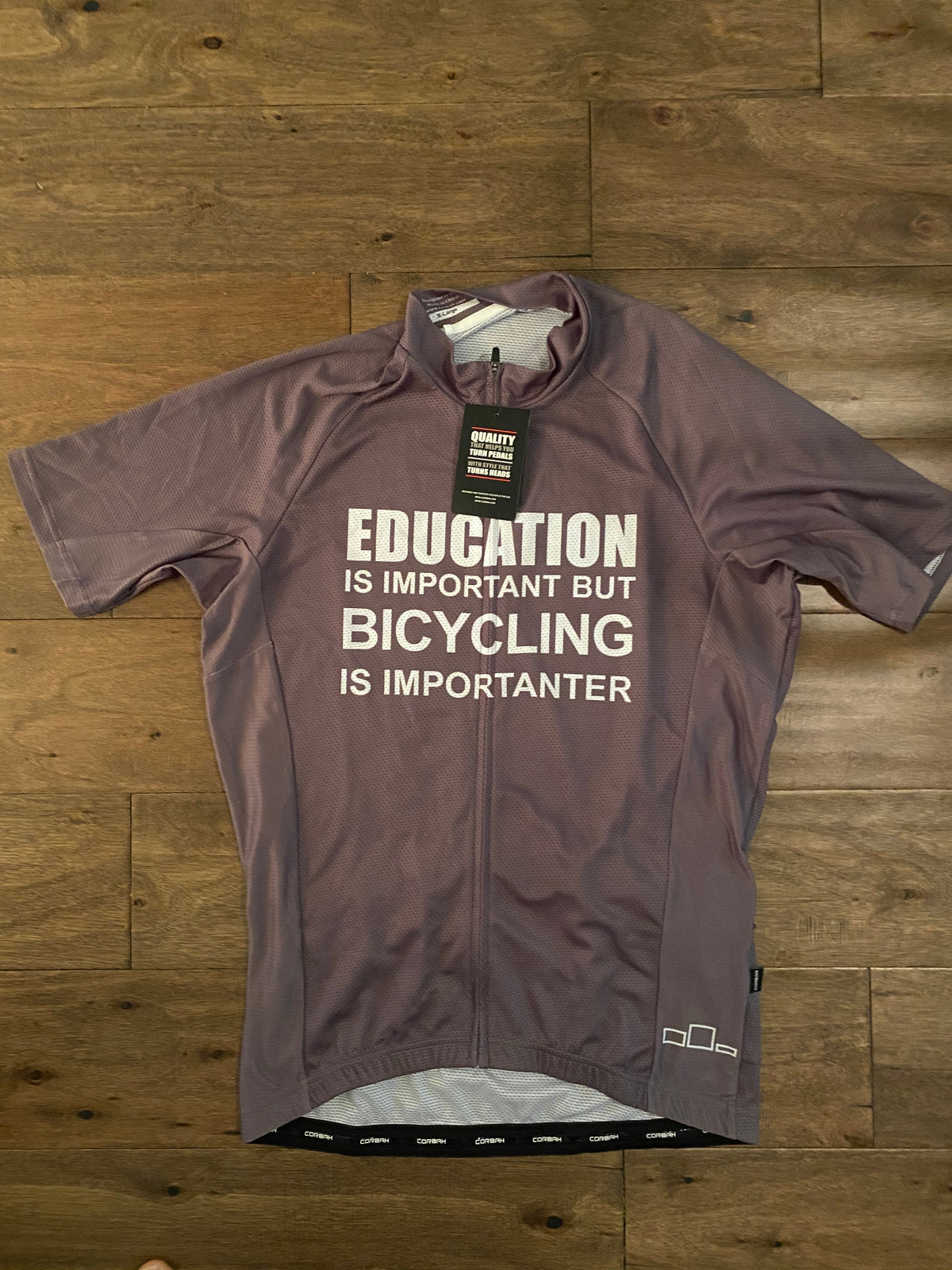 Cyclist wearing a Corbah short sleeve cycling jersey