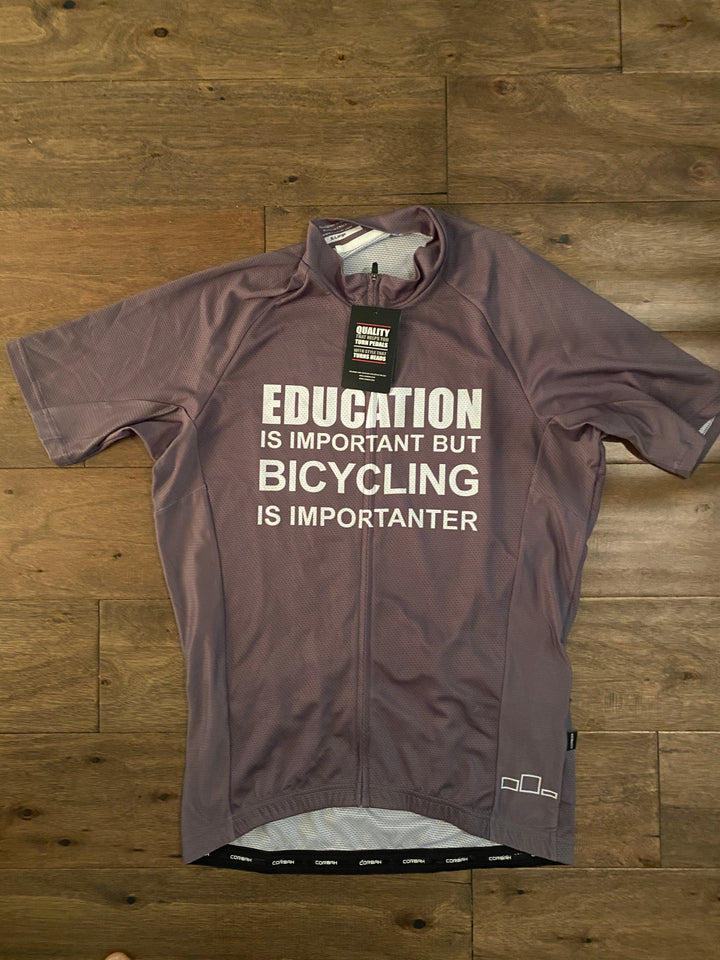 Cyclist wearing a Corbah short sleeve cycling jersey