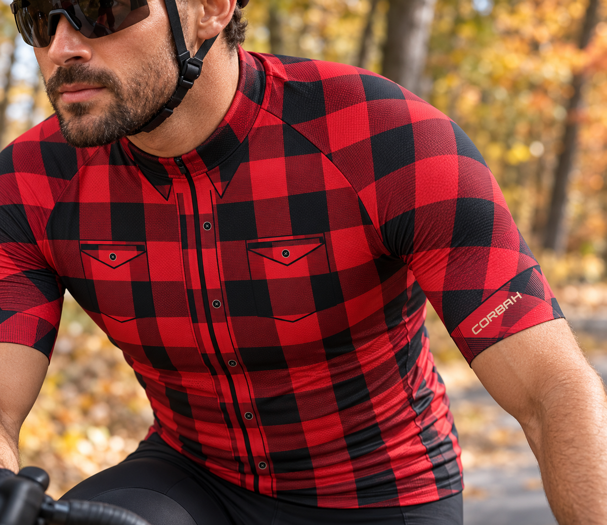 Close-up of The Lumberjack jersey: printed buttons, flap chest pockets, collar points and the CORBAH wordmark on the left sleeve.