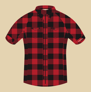 Front artwork of The Lumberjack jersey: buffalo check, printed placket and buttons beside the zip, twin flap chest pockets, rolled cuffs and CORBAH on the left sleeve.